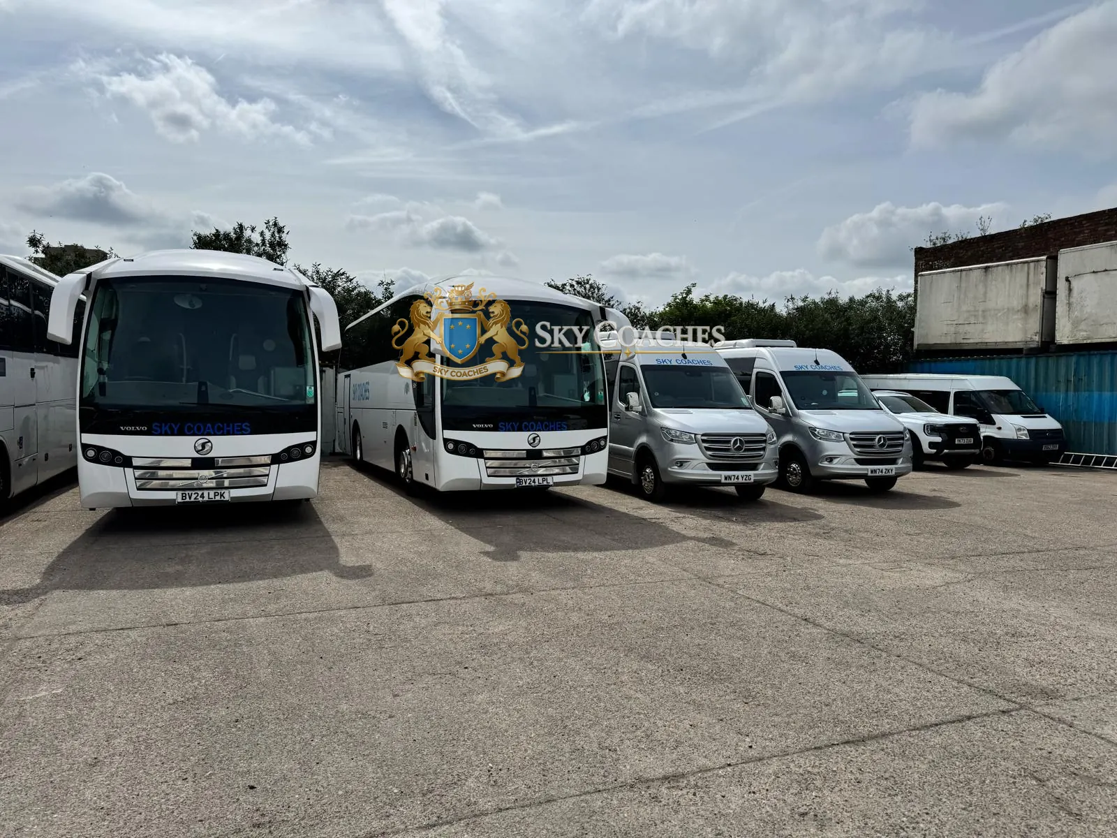 Sky Coaches coaches and Mercedes-Benz Sprinters in the depot