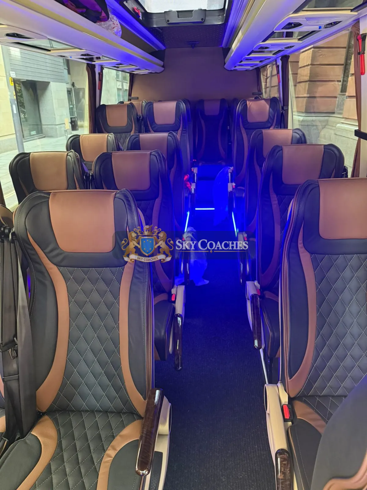 Executive minibus interior with blue ambient lighting