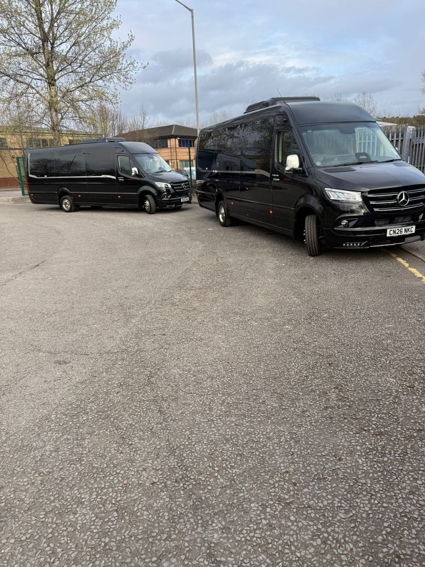 Sky Coaches black executive minibus fleet