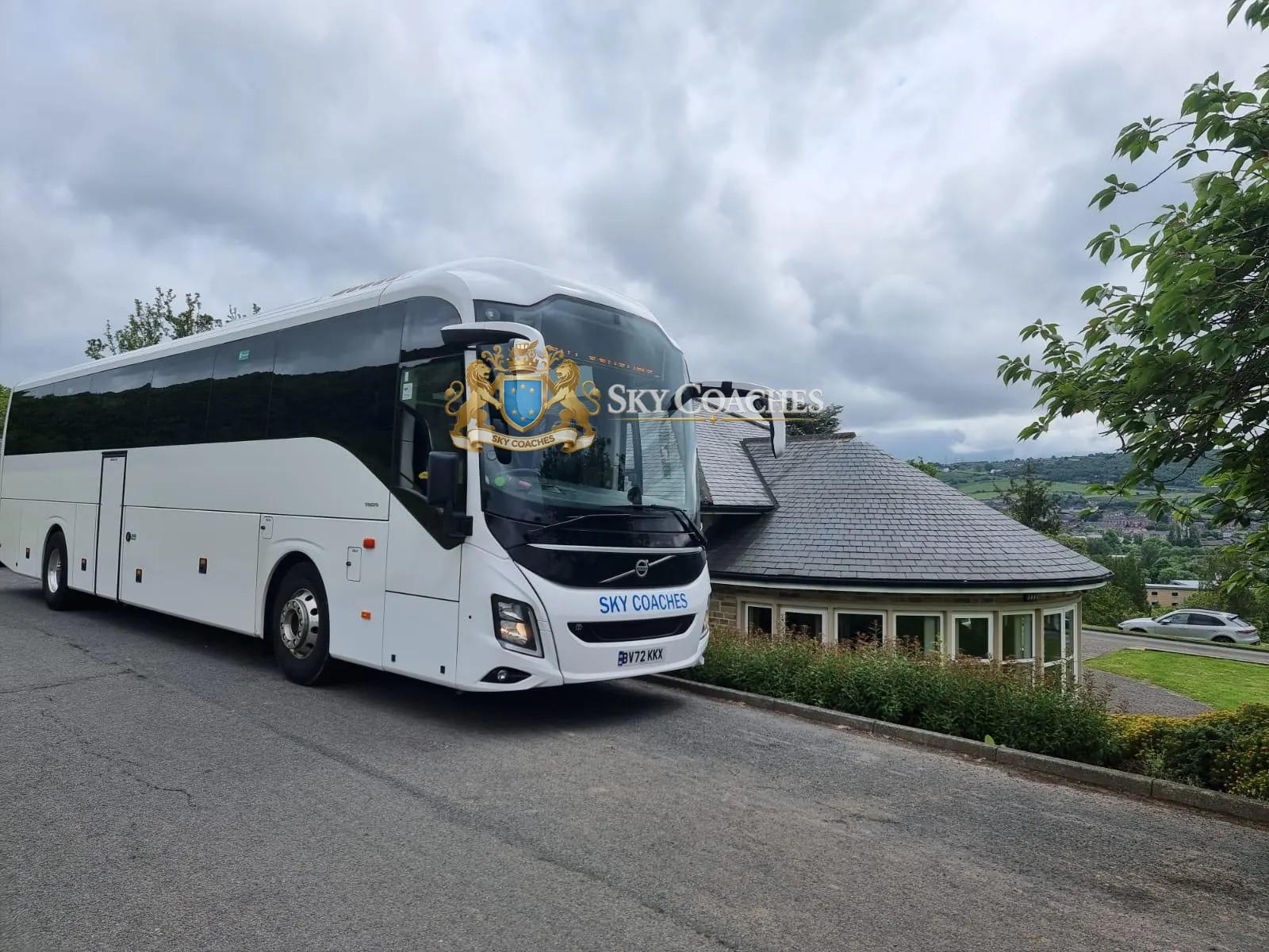 Sky Coaches Volvo coach on a hillside road