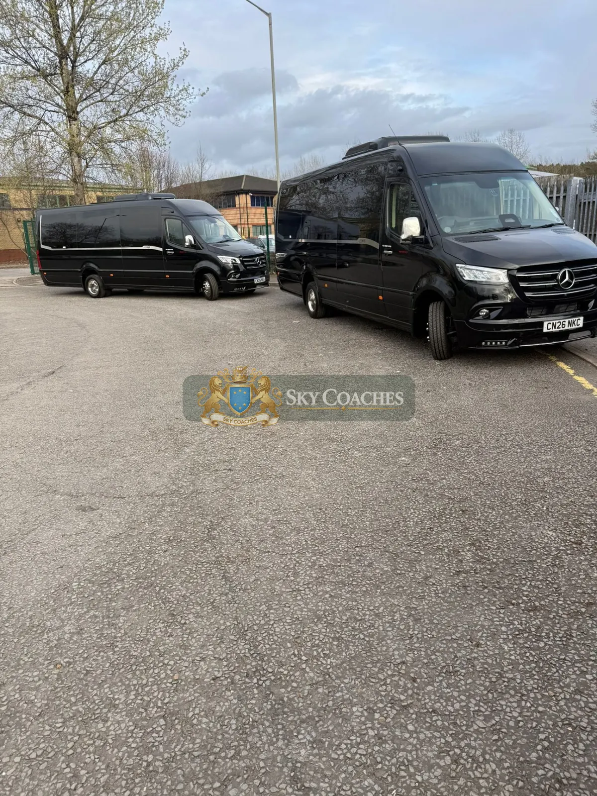 Sky Coaches black executive minibus fleet