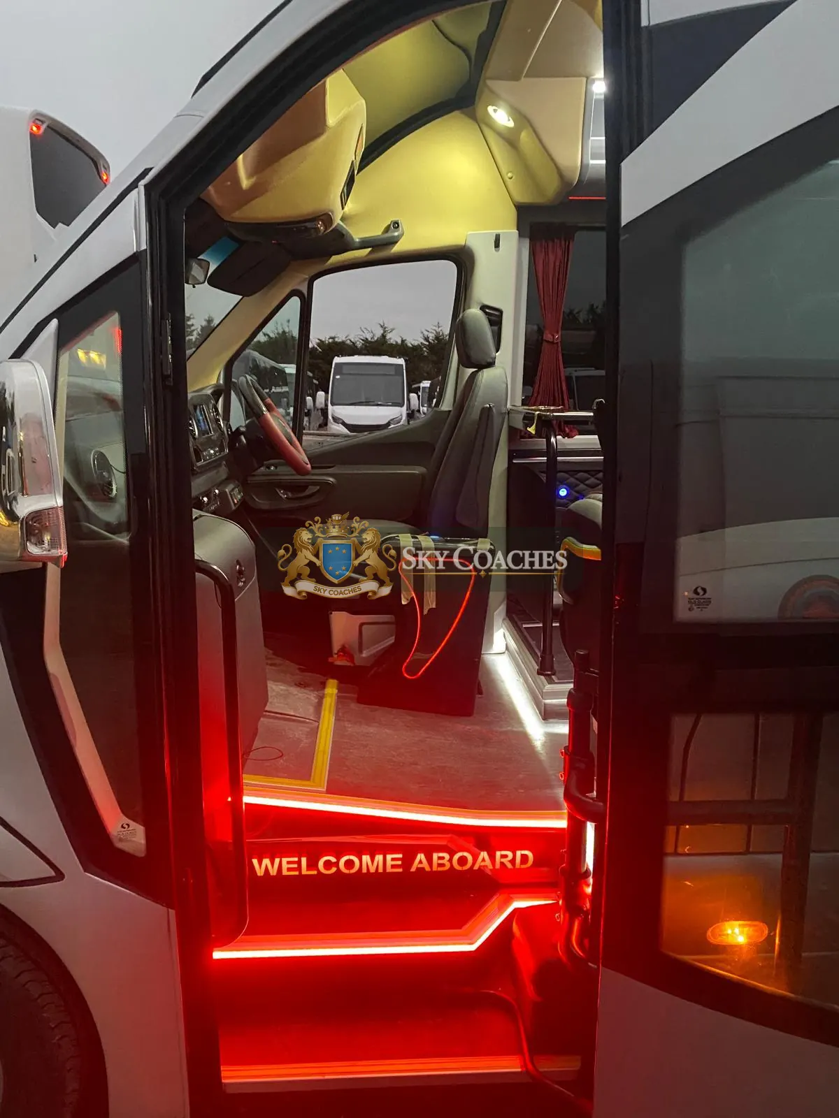 Illuminated ‘Welcome Aboard’ entry step on Sky Coaches vehicle