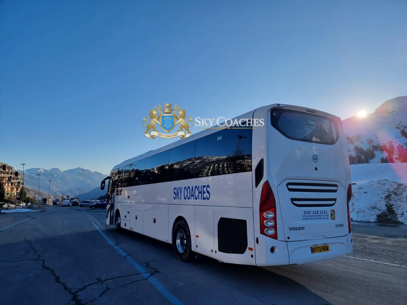 Sky Coaches Volvo coach in the mountains at sunset