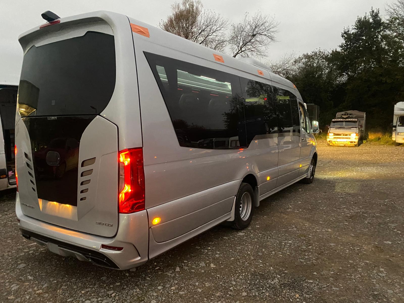 Silver Mercedes-Benz Sprinter — rear view