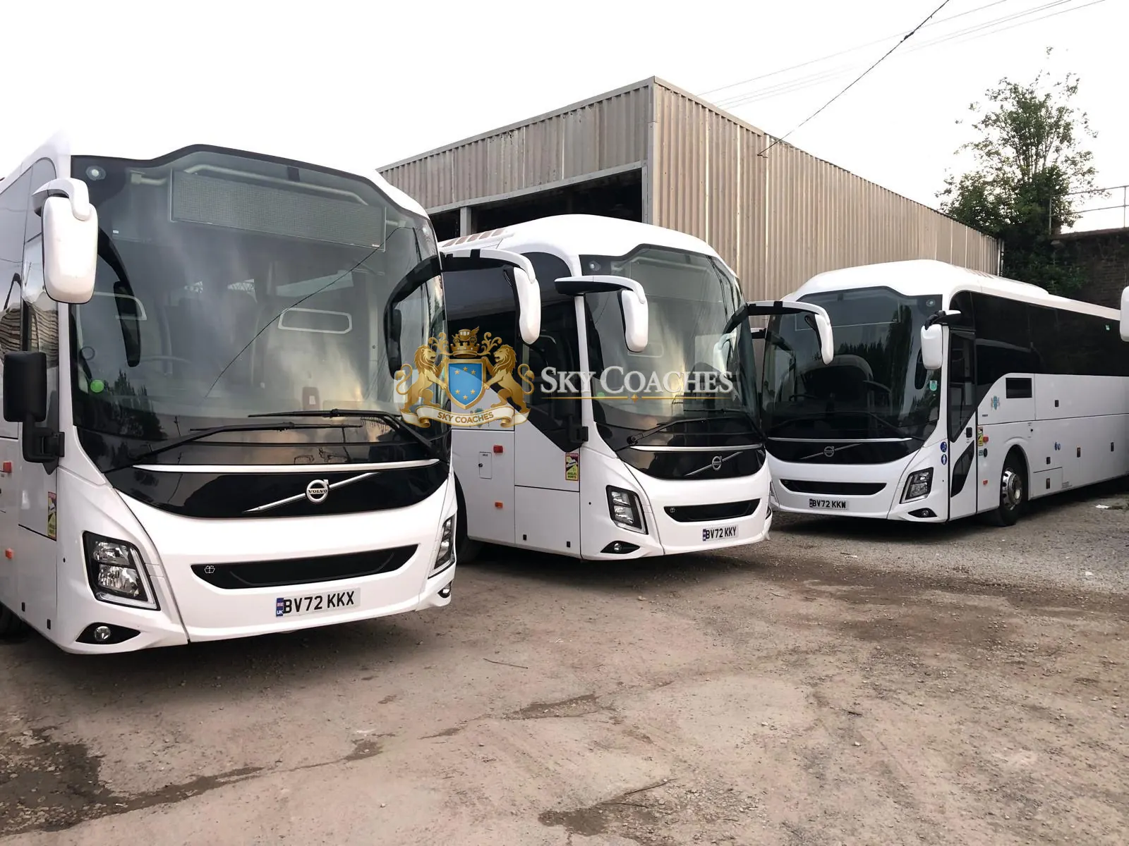Three Sky Coaches Volvo coaches parked at the depot